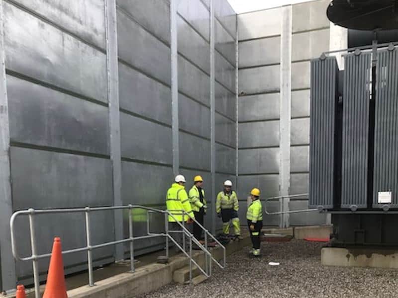 The Kimpton Acoustics team on site as the Acoustic Barriers are dismantled with the decommissioned transformer to the side working around impressed voltage