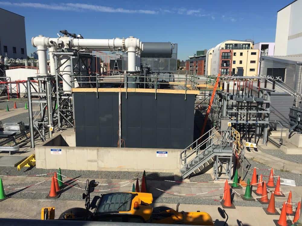 The view across the site showing the new enclosure and the GIS transformers in place