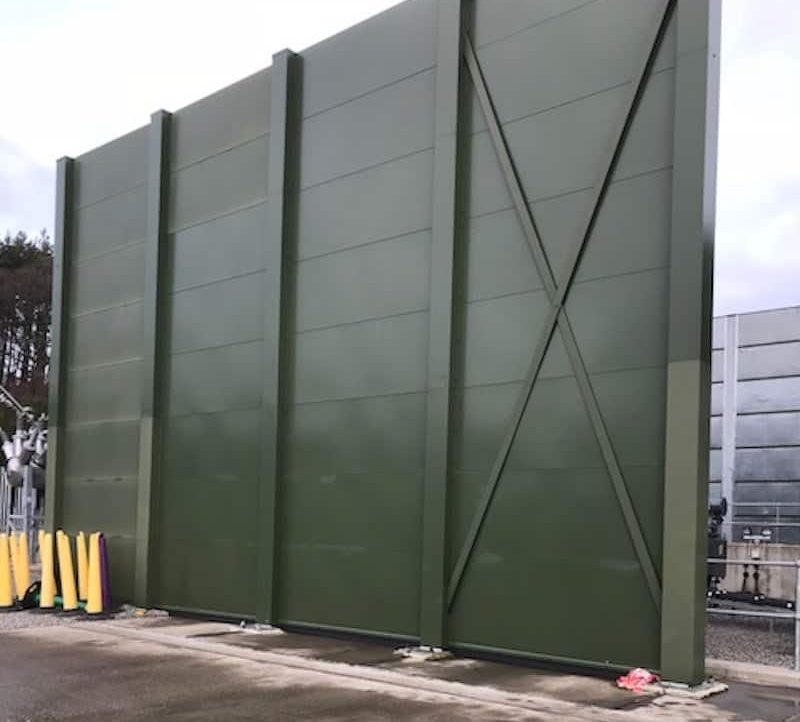 With the new transformer in place, the new acoustic barriers are installed to enclose and reduce the transformer noise impressed voltage